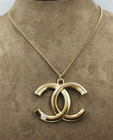 chanel cc logo necklace replica|chanel cc logo pendant necklace.